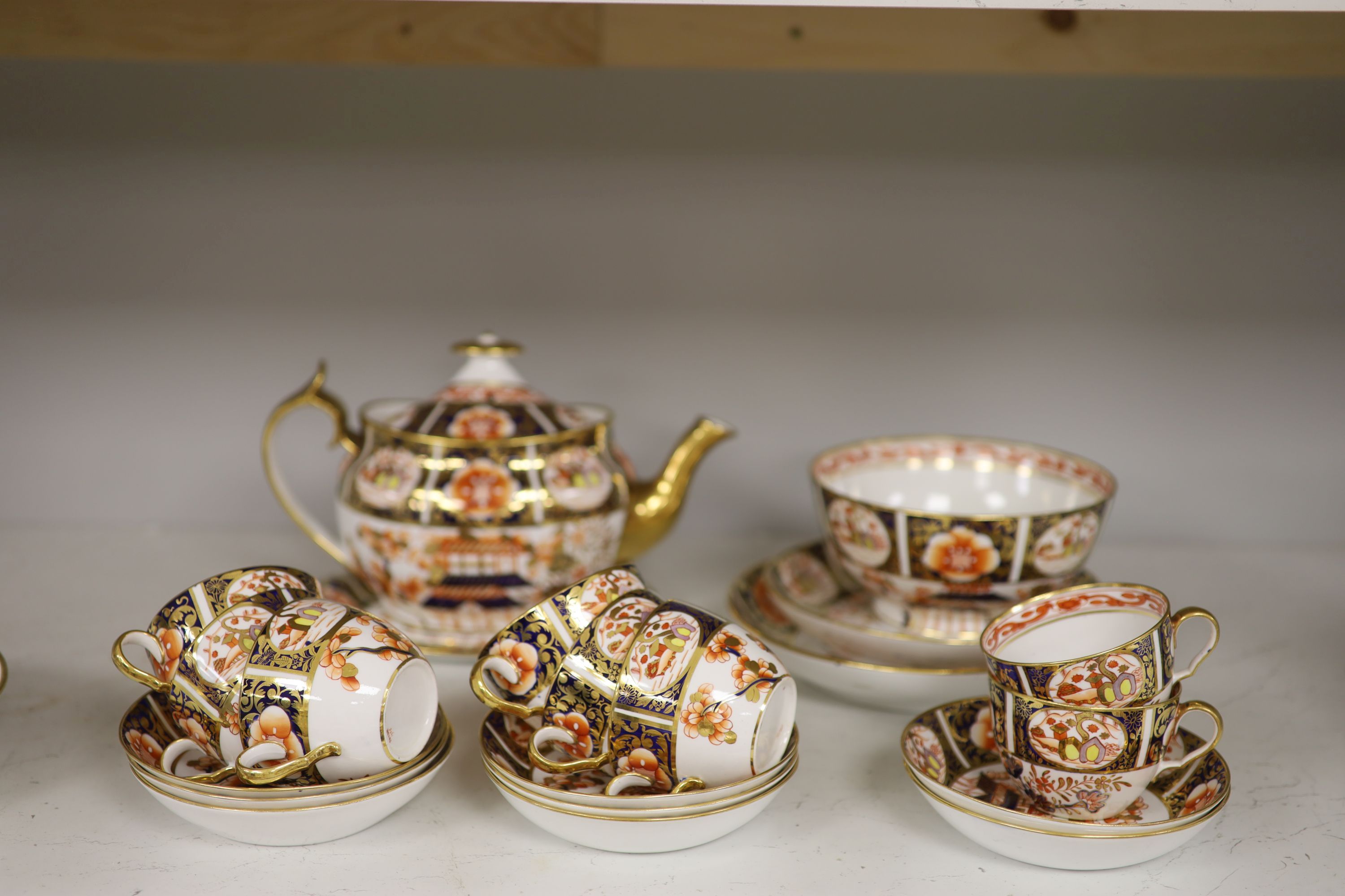 A Spode part tea service painted in imari style with pattern 1956,